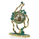 Lüks Özel Tasarım Altın Vurgulu Teal Dekoratif Masa Saati – İskelet Kadranlı Şık Ev Aksesuarı