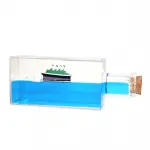 Deniz Havası Şişede: Batmayan Gemi ve Buzdağı Temalı Sıvı Hareketli Masaüstü Dekorasyonu